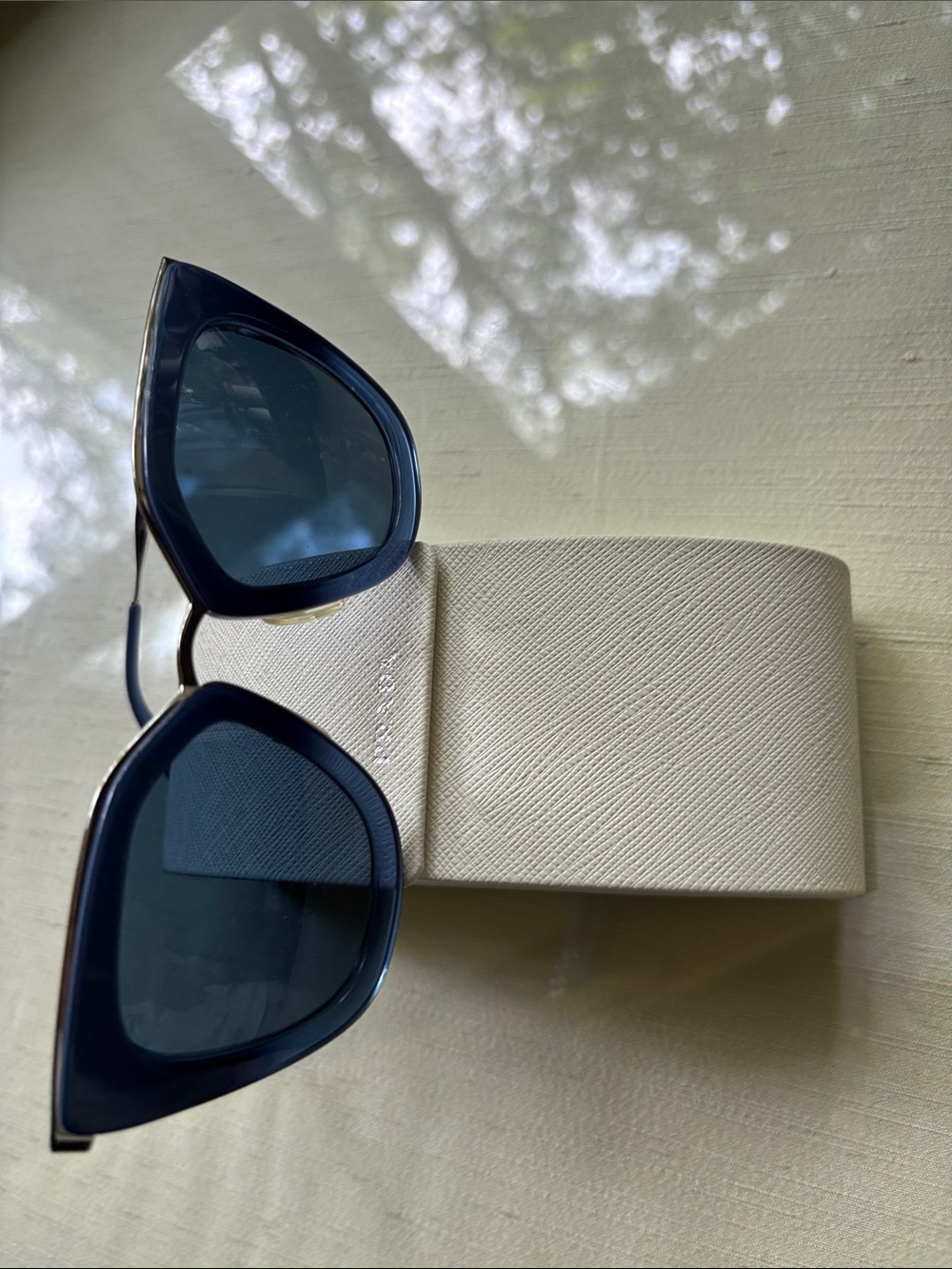 Prada Blue Cat-Eye Women's Sunglasses with Cream Case